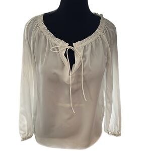 Joe Fresh ruffle neck and sleeve blouse.